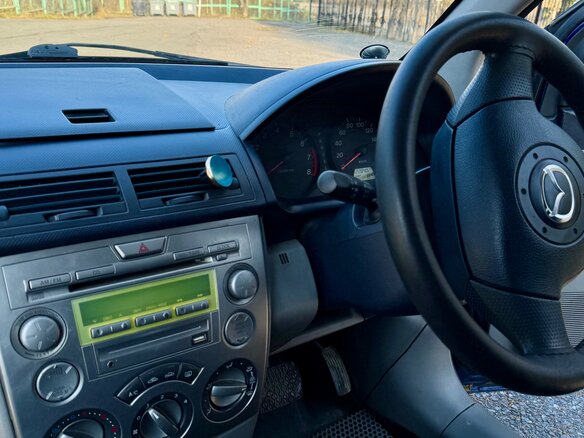 2003 Mazda Demio II (DY), синий, 255000 рублей - вид 12