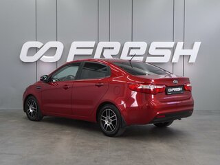 2013 Kia Rio 5-speed III, красный, 829000 рублей, вид 2