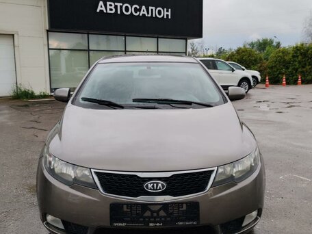 2011 Kia Cerato 6-speed II, серый, 1099000 рублей, вид 5