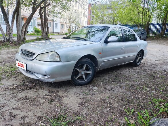 1999 Kia Clarus II, серый, 97000 рублей