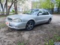 1999 Kia Clarus II, серый, 97000 рублей