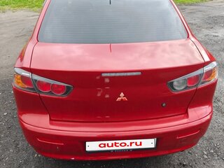 2011 Mitsubishi Lancer X Рестайлинг, красный, 720000 рублей, вид 4