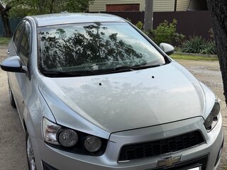 2012 Chevrolet Aveo II, серебристый, 510000 рублей, вид 1