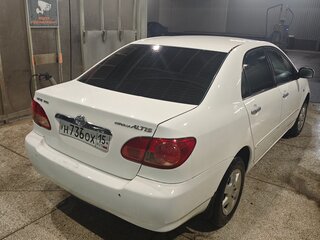 2004 Toyota Corolla IX (E120, E130) Рестайлинг, белый, 450000 рублей, вид 4