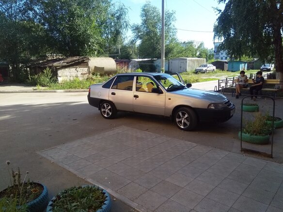 2008 Daewoo Nexia I Рестайлинг, серебристый - вид 2