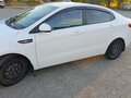 2015 Kia Rio III Рестайлинг, белый, 920000 рублей - вид 1