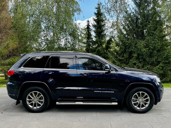 2014 Jeep Grand Cherokee IV (WK2) Рестайлинг, синий, 2500000 рублей - вид 1