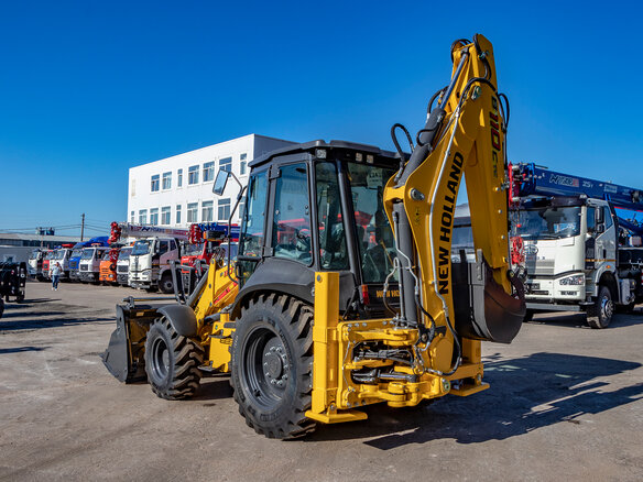 2024 New Holland B110C, жёлтый - вид 2