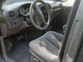 2003 Dodge Caravan IV, зелёный, 390000 рублей - вид 6