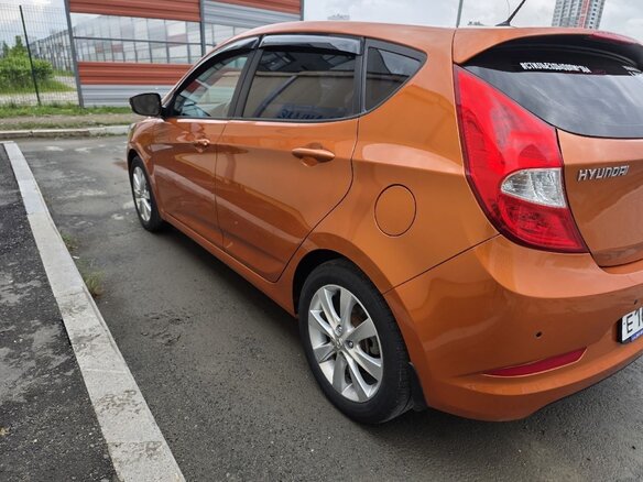 2015 Hyundai Solaris I Рестайлинг, оранжевый, 1201000 рублей - вид 1