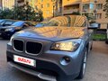 2012 BMW X1 20i I (E84), серый - вид 7