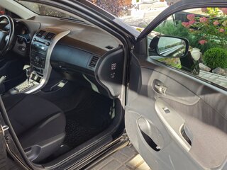 2010 Toyota Corolla X (E140, E150) Рестайлинг, чёрный, 950000 рублей, вид 5