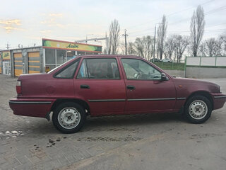 2007 Daewoo Nexia I, пурпурный, 195000 рублей, вид 2