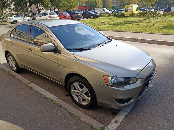 2008 Mitsubishi Lancer X, бежевый, 610000 рублей