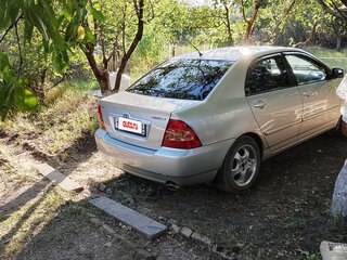 2006 Toyota Corolla IX (E120, E130) Рестайлинг, серебристый, 550000 рублей, вид 3