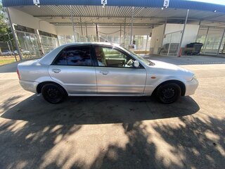 2003 Mazda Familia VIII (BJ), серебристый, 180000 рублей, вид 5