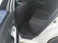 2011 Toyota Corolla X (E140, E150) Рестайлинг, белый, 1100000 рублей - вид 7