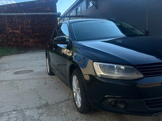 2014 Volkswagen Jetta VI Рестайлинг, чёрный, 600000 рублей, вид 3
