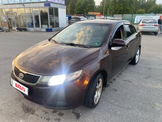 2010 Kia Cerato 6-speed II, пурпурный, 485000 рублей, вид 1