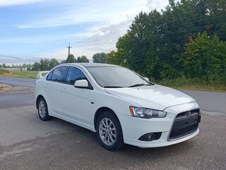 2013 Mitsubishi Lancer X Рестайлинг, белый, 590000 рублей, вид 2