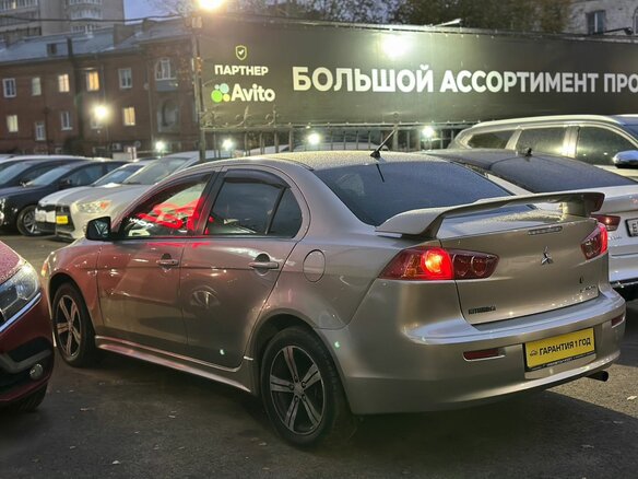 2008 Mitsubishi Lancer X, золотистый - вид 3