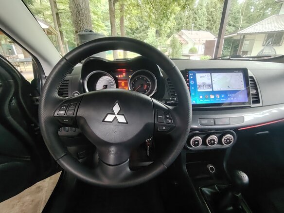 2008 Mitsubishi Lancer X, чёрный - вид 13