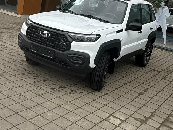 2026 Lada (ВАЗ) Niva Travel I Рестайлинг, белый, 1717000 рублей - вид 1