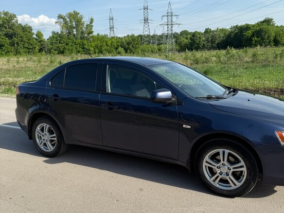 2007 Mitsubishi Lancer X, синий - вид 4