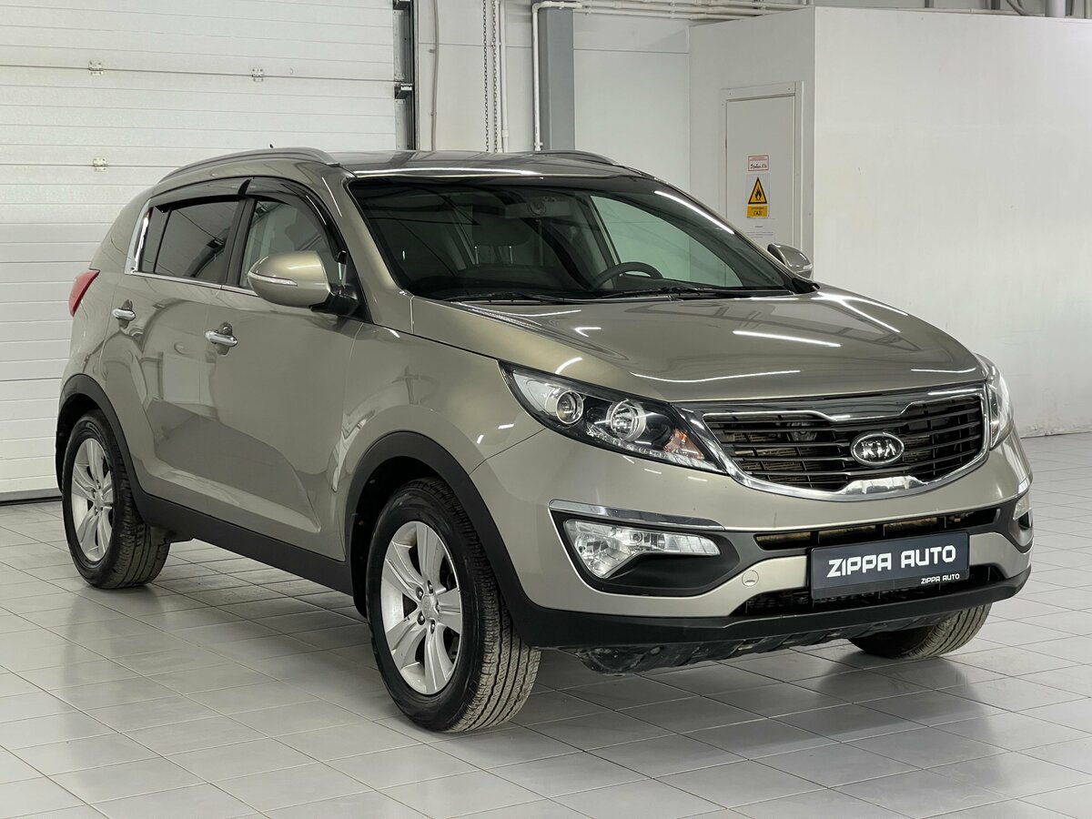 Открыть фотографии: Kia Sportage III