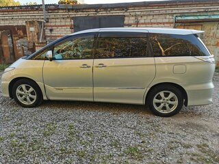 2011 Toyota Estima III Рестайлинг, серебристый, 1450000 рублей, вид 3