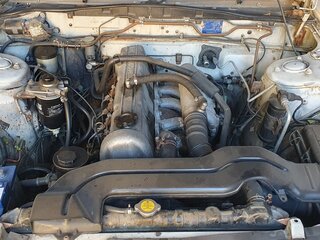 1986 Nissan Laurel V (C32), белый, 300000 рублей, вид 4