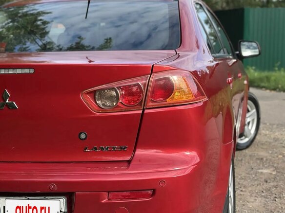 2008 Mitsubishi Lancer X, красный - вид 8