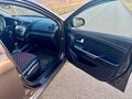2016 Kia Rio III Рестайлинг, коричневый - вид 9