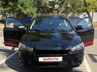 2010 Mitsubishi Lancer X, чёрный, 645000 рублей, вид 1
