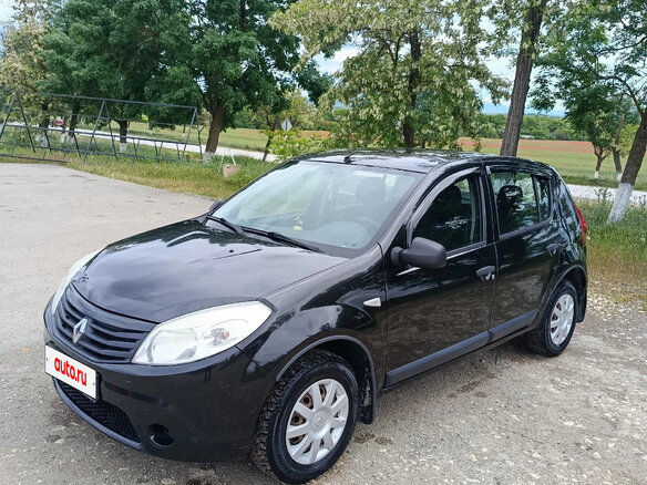 2013 Renault Sandero I, чёрный, 630000 рублей
