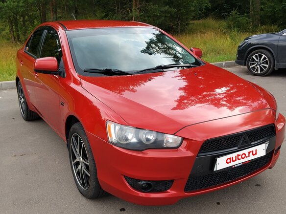 2008 Mitsubishi Lancer X, красный - вид 1