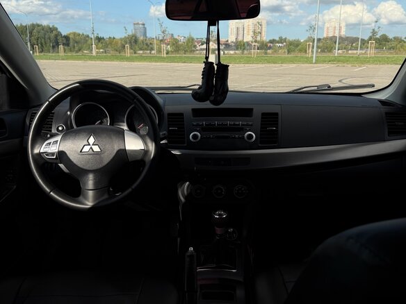 2012 Mitsubishi Lancer X Рестайлинг, серебристый, 850000 рублей - вид 9