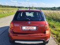 2010 Suzuki SX4 I (Classic) Рестайлинг, оранжевый - вид 4
