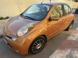 2009 Nissan Micra III (K12), оранжевый, 700000 рублей, вид 1