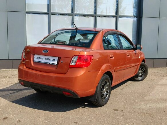 2010 Kia Rio II Рестайлинг, оранжевый - вид 5