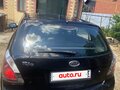 2011 Kia Rio II Рестайлинг, чёрный - вид 2