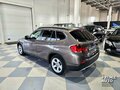 2012 BMW X1 20d I (E84), коричневый - вид 6