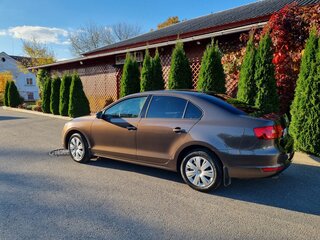 2011 Volkswagen Jetta VI, коричневый, 930000 рублей, вид 2