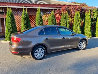 2011 Volkswagen Jetta VI, коричневый, 930000 рублей, вид 4