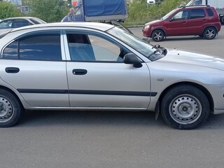 2002 Mitsubishi Carisma I Рестайлинг, серебристый, 320000 рублей, вид 3