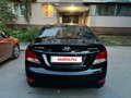 2012 Hyundai Solaris I, чёрный, 860000 рублей - вид 1