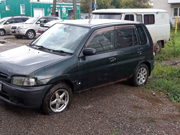 1999 Mazda Demio I (DW), зелёный, 100000 рублей