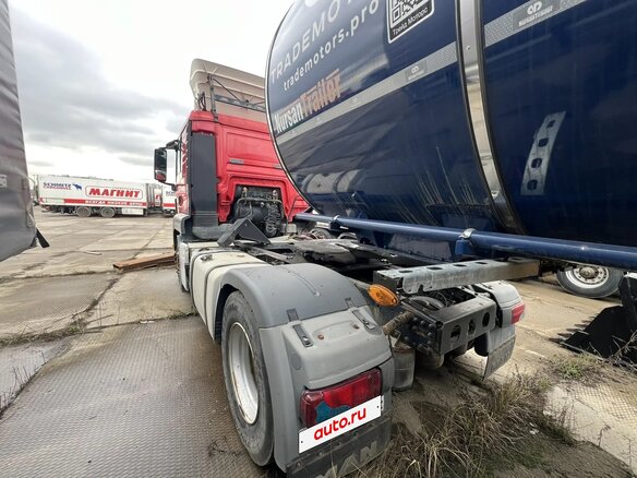 2011 MAN TGS, красный, 1334000 рублей - вид 1
