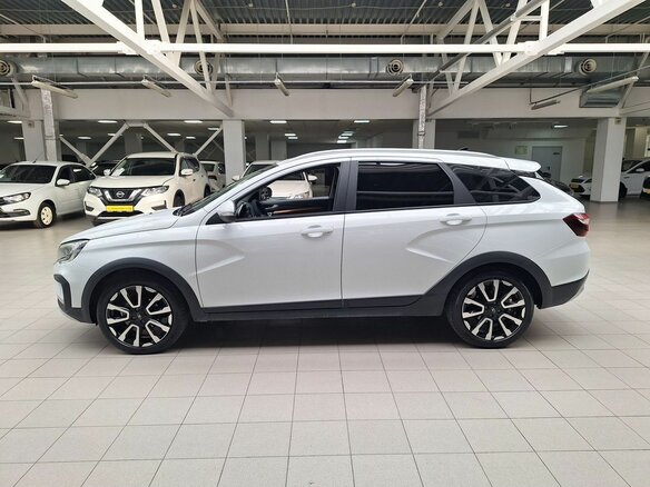 2024 Lada (ВАЗ) Vesta SW Cross I Рестайлинг (NG), белый - вид 3