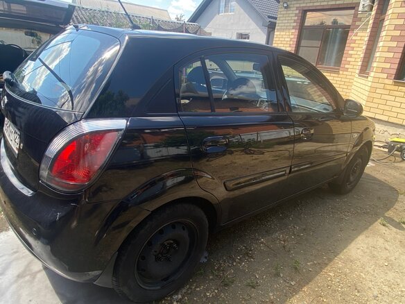 2011 Kia Rio II Рестайлинг, чёрный - вид 8